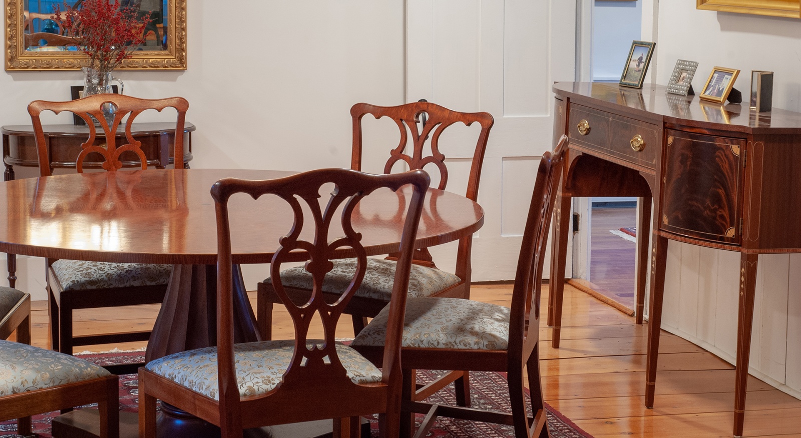 Dining table and chairs with a side table, created by Roger Myers